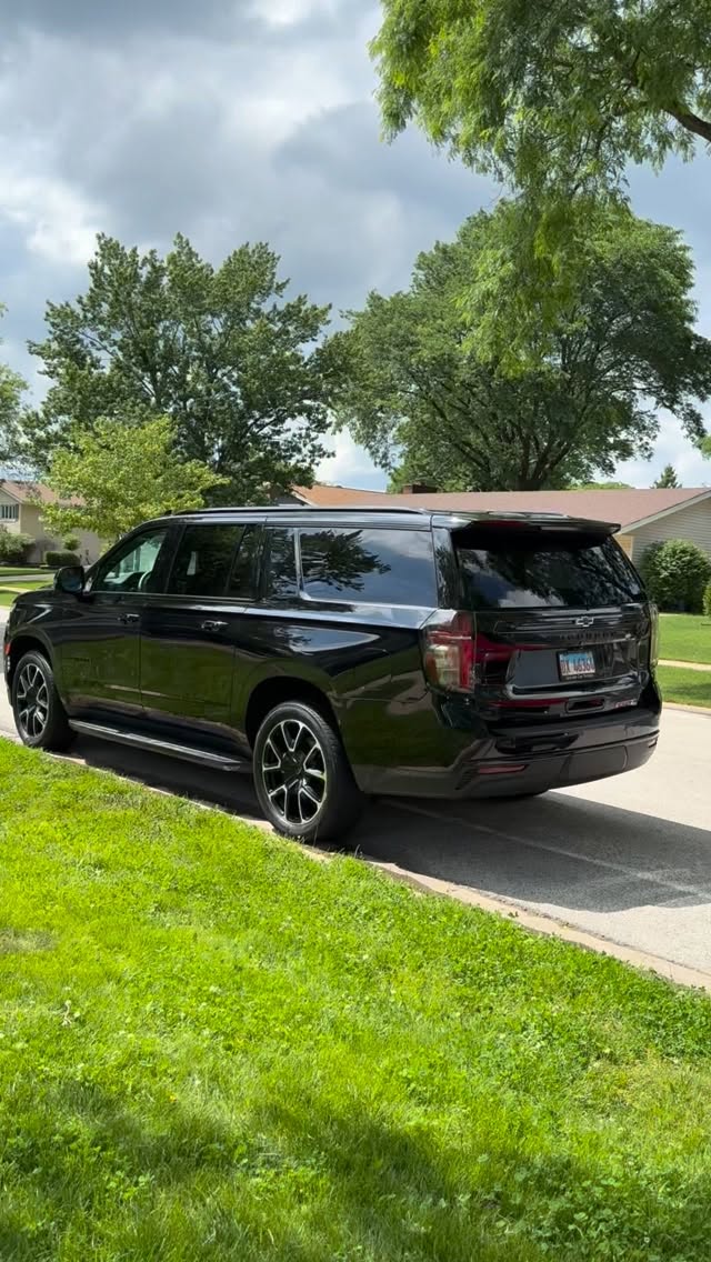 Black Chevy Suburban RST after weekly maintenance wash