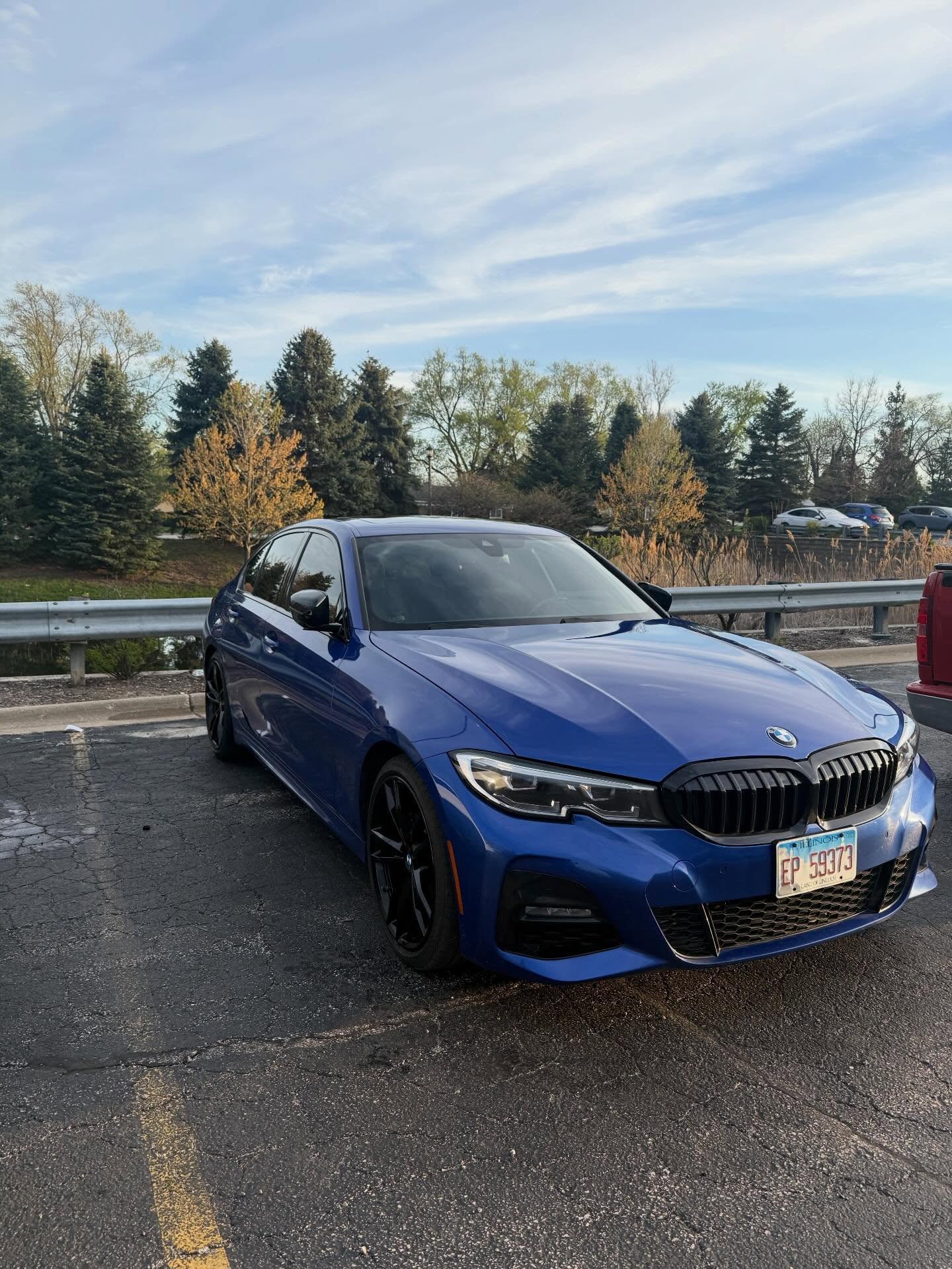 Blue BMW 3 Series after a full exterior detail