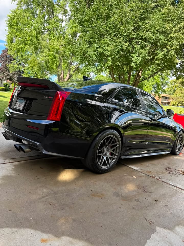 Black Cadillac ATS-V, rear view, glossy after detail